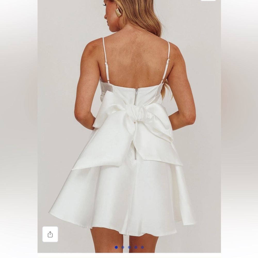 Elegant White Dress with Bow